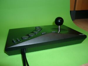 neogeo_mod_007 cutting pvc to get both cable out of the neogeostick